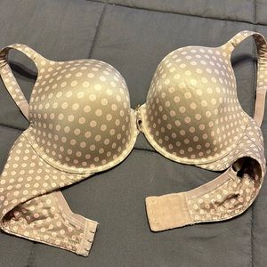 Pink/grey polka dot Victoria’s Secret bra.